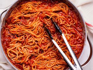 Marry Me Pasta in a pan with tongs
