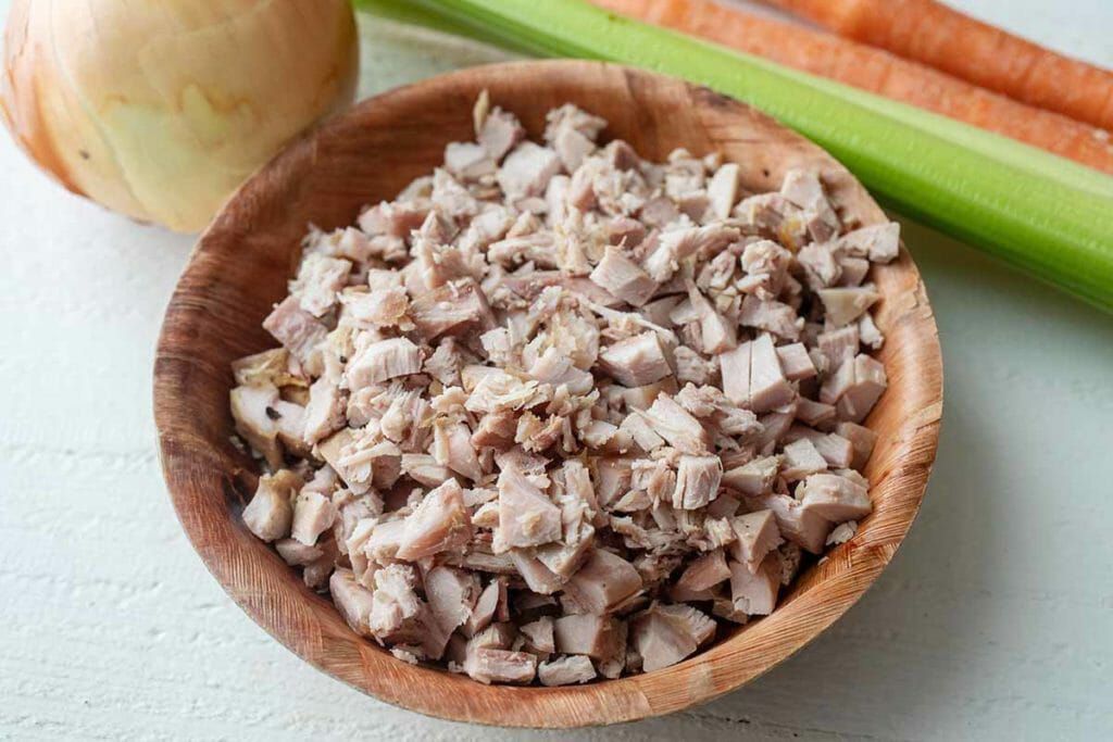Bowl of leftover turkey for mini pot pies