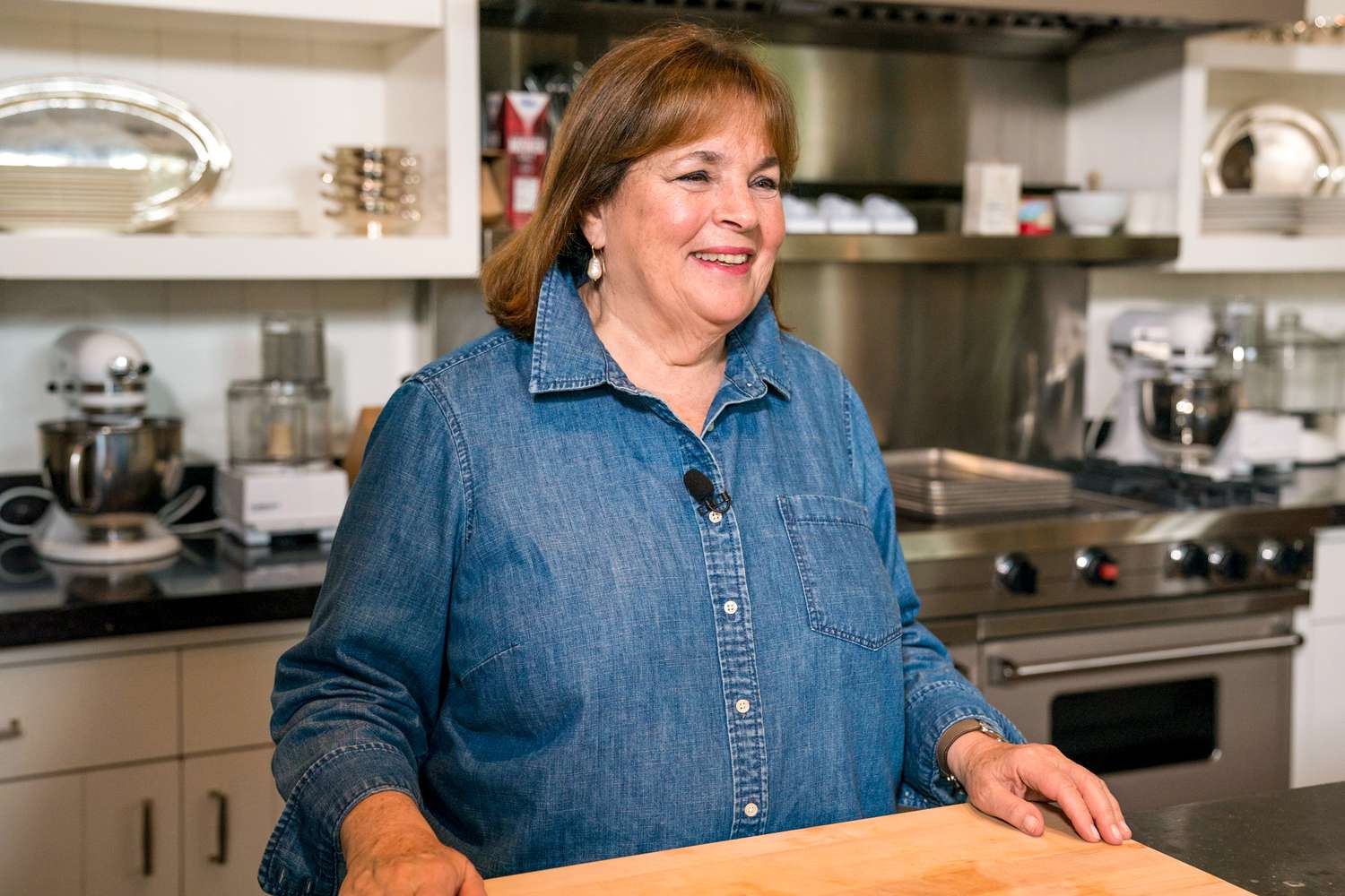 Ina Garten in a kitchen, standing near a counter