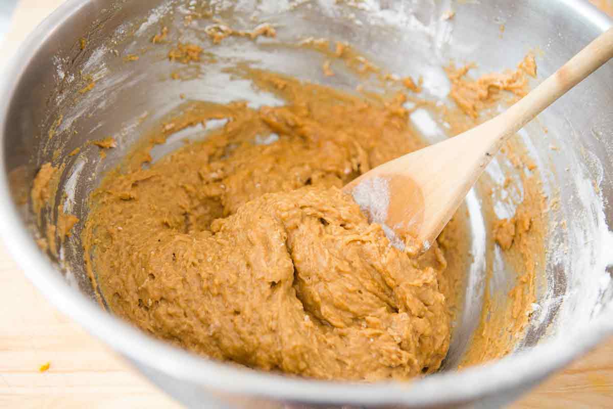How to Make Pumpkin bread combine the batter in a bowl and mix with wooden spoon