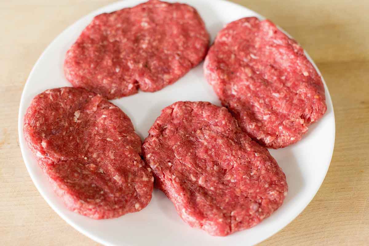 Shape the ground beef mixture into round salisbury steaks