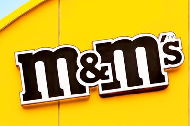 The MMs logo on a yellow background