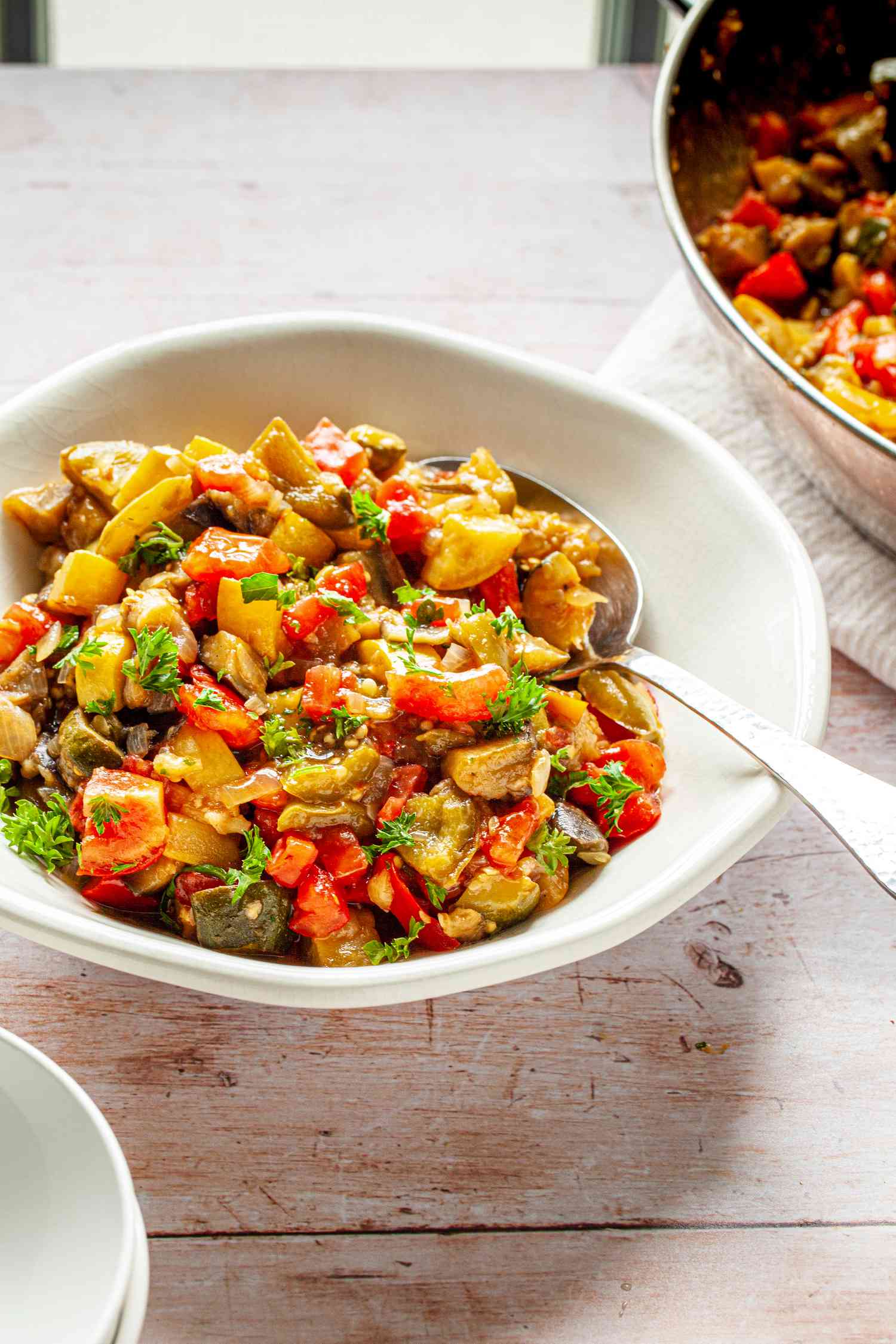 Bowl of Classic Ratatouille with a Spoon