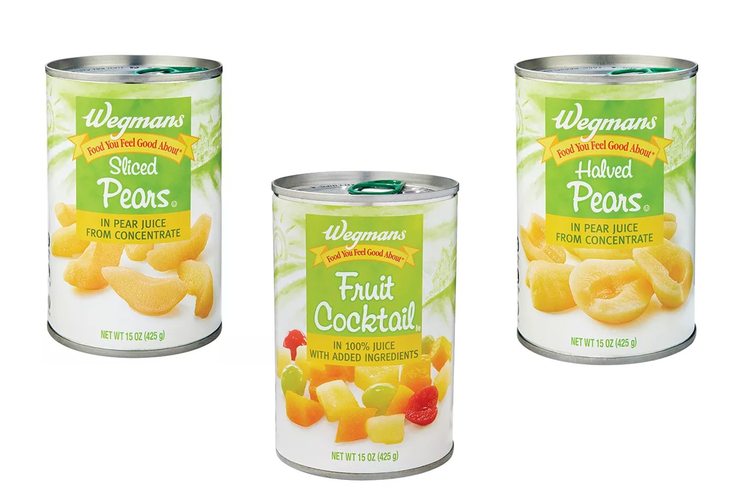 Three cans of Wegmans canned fruits labeled sliced pears fruit cocktail and halved pears
