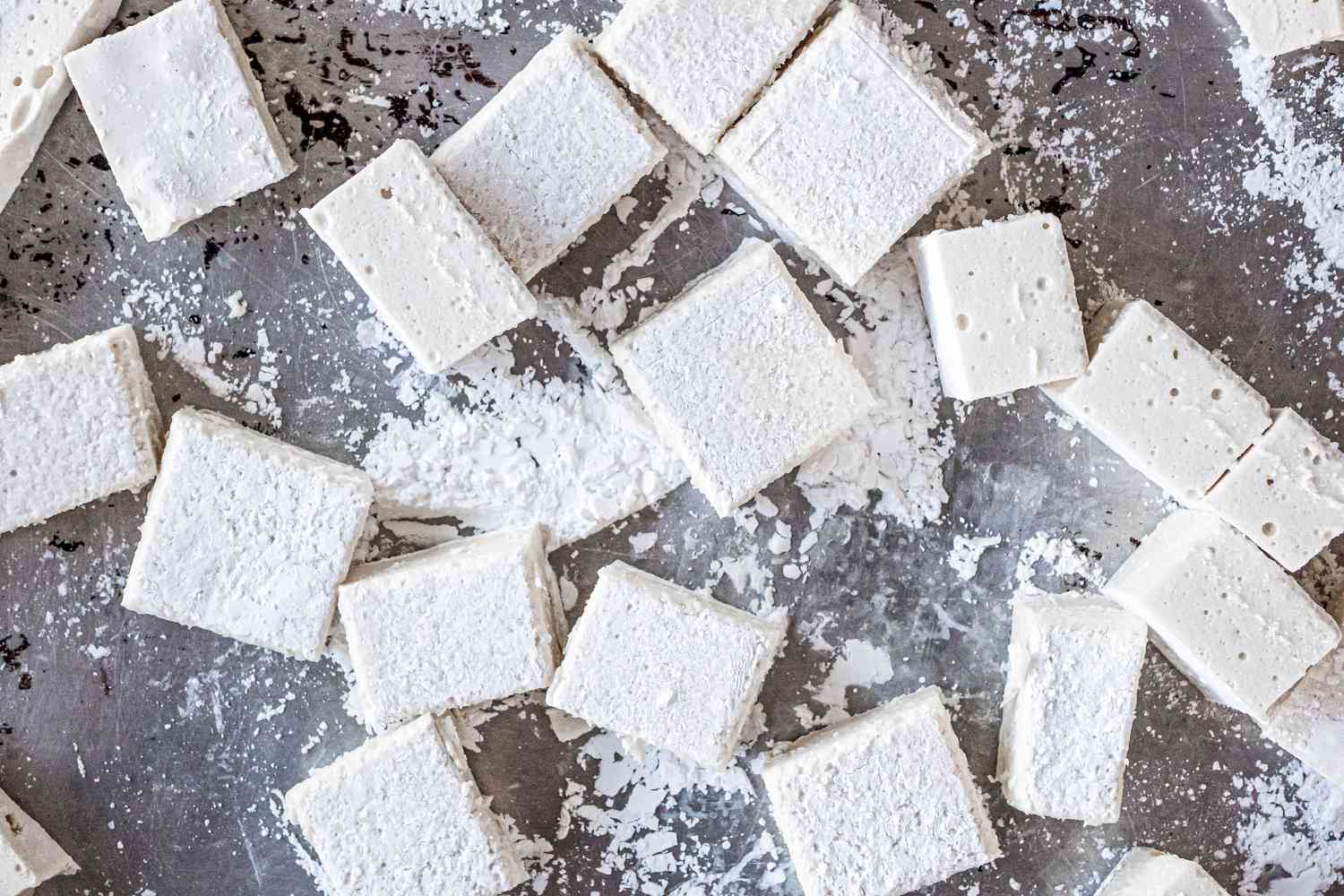 Vegan marshmallows on a tray and covered in cornstarch