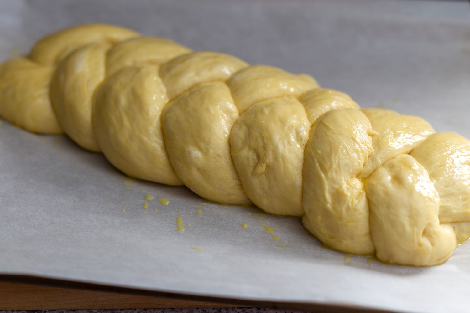 proofed challah with egg wash