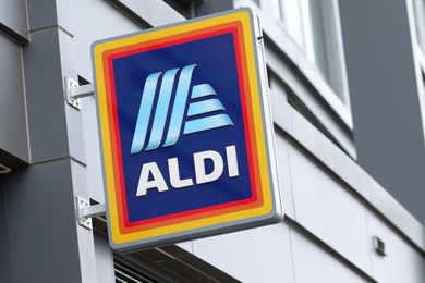 Aldi store sign on the side of a building
