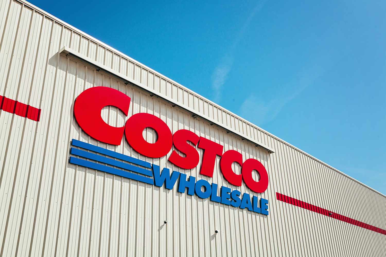 The exterior of a Costco Wholesale storefront featuring the companys logo