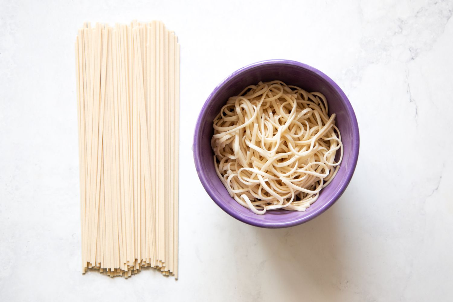 Dried Udon on the Left and Cooked Udon in a Bowl on the Right