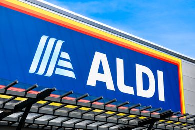Outdoor photo of a Aldi store sign and logo