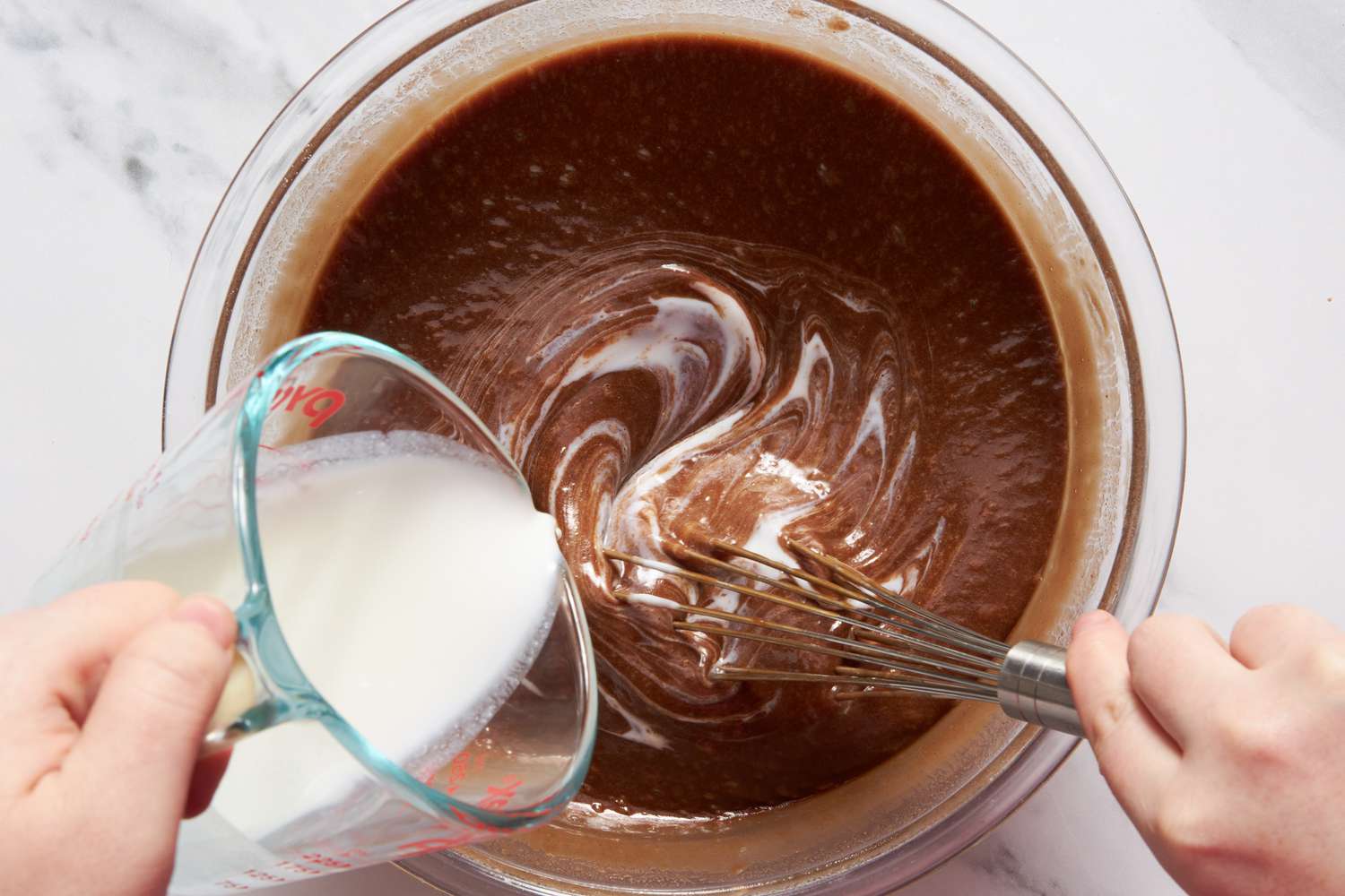 Buttermilk whisked into the cake batter for Dr. Pepper cake recipe