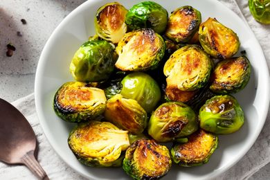 roasted brussels sprouts on a white platter