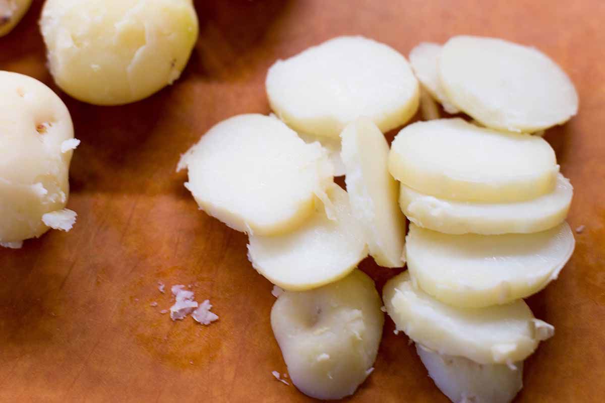 Slice the potatoes for German Potato Salad