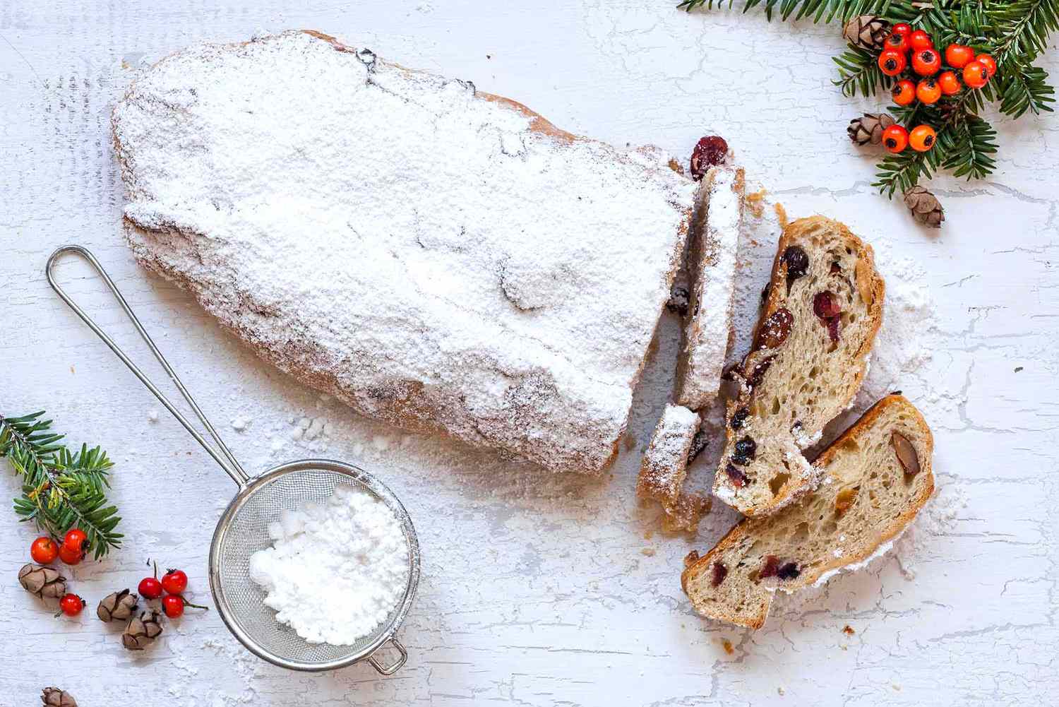 A loaf of stollen with a few slices showing
