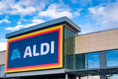 Aldi storefront with its logo visible on the sign