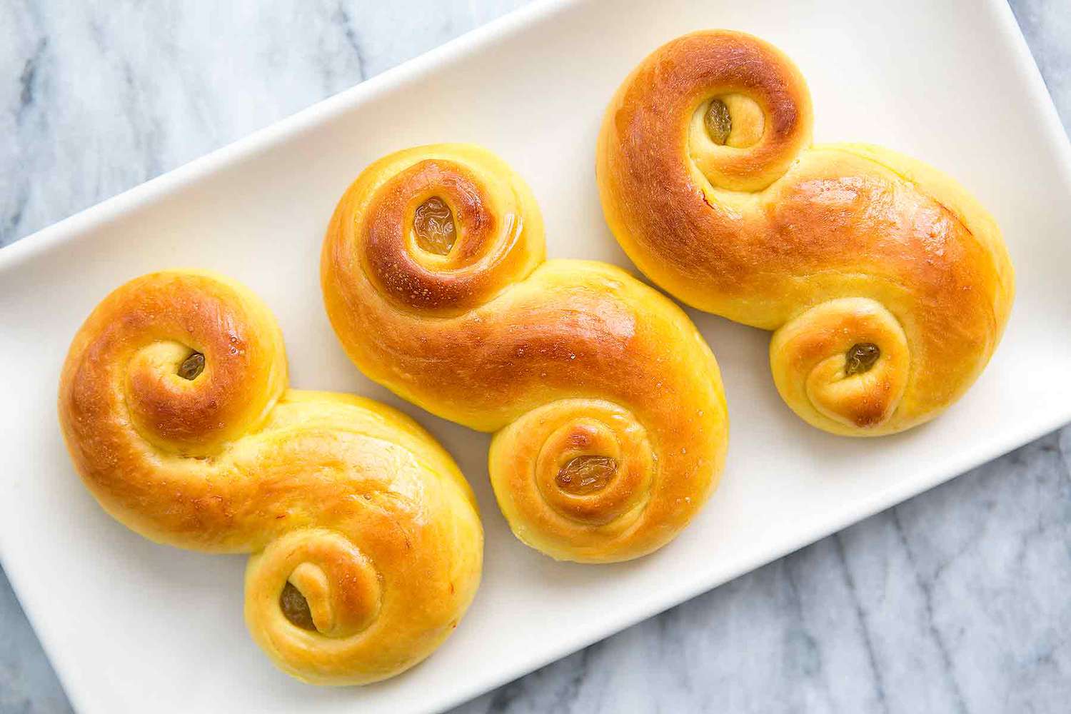 Three St Lucia Saffron Buns on a Tray