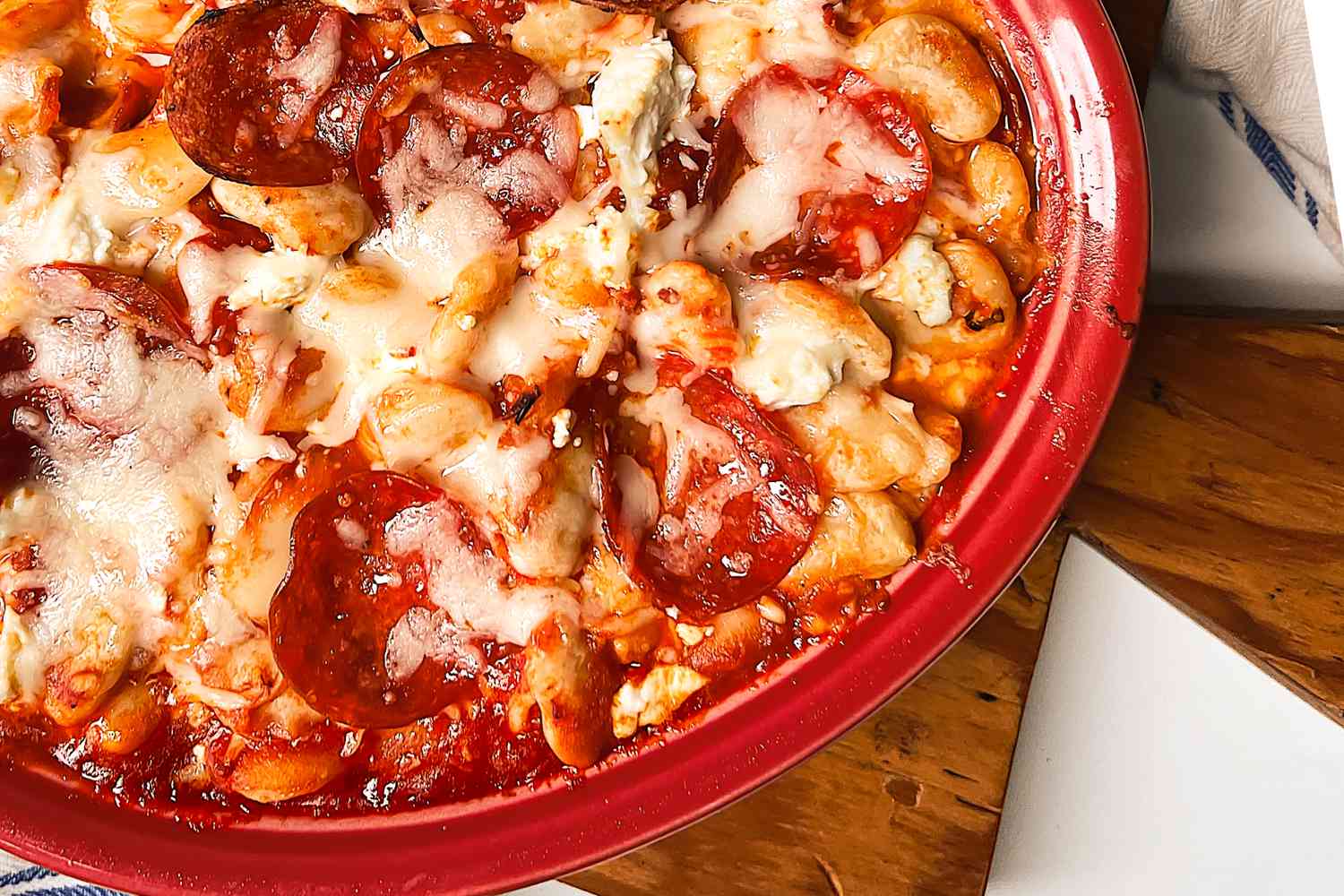Pizza beans in a red casserole dish