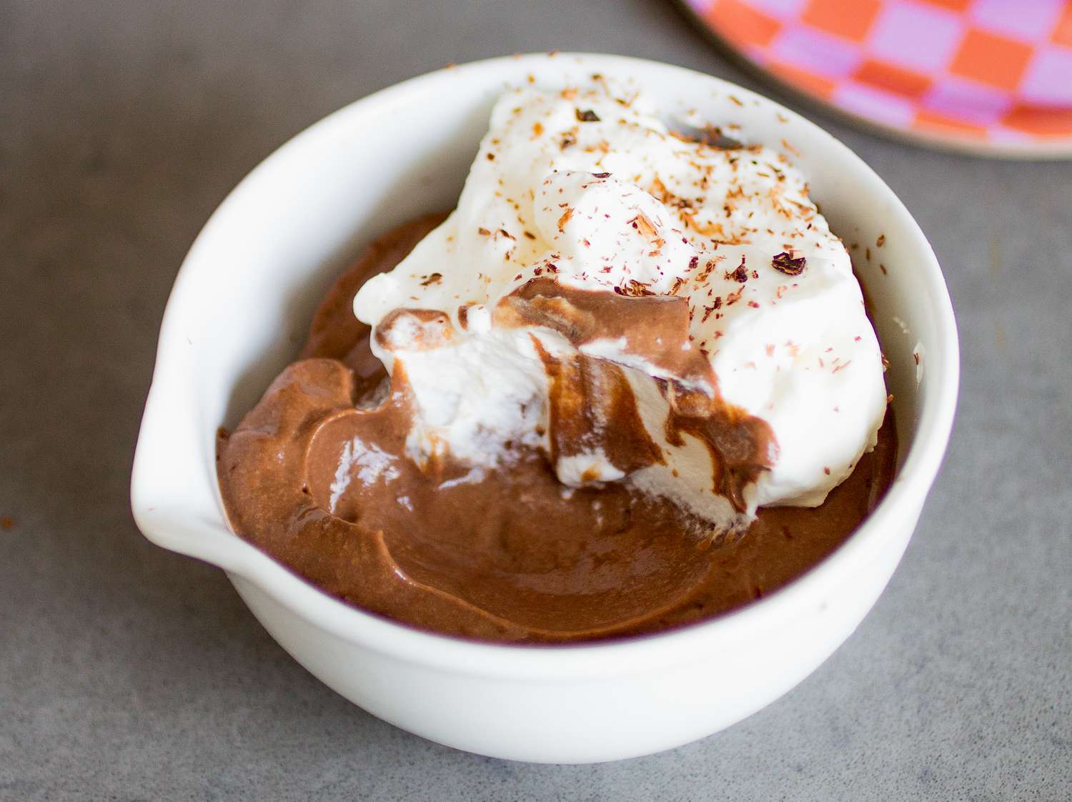bowl of chocolate pudding (missing a spoonful)