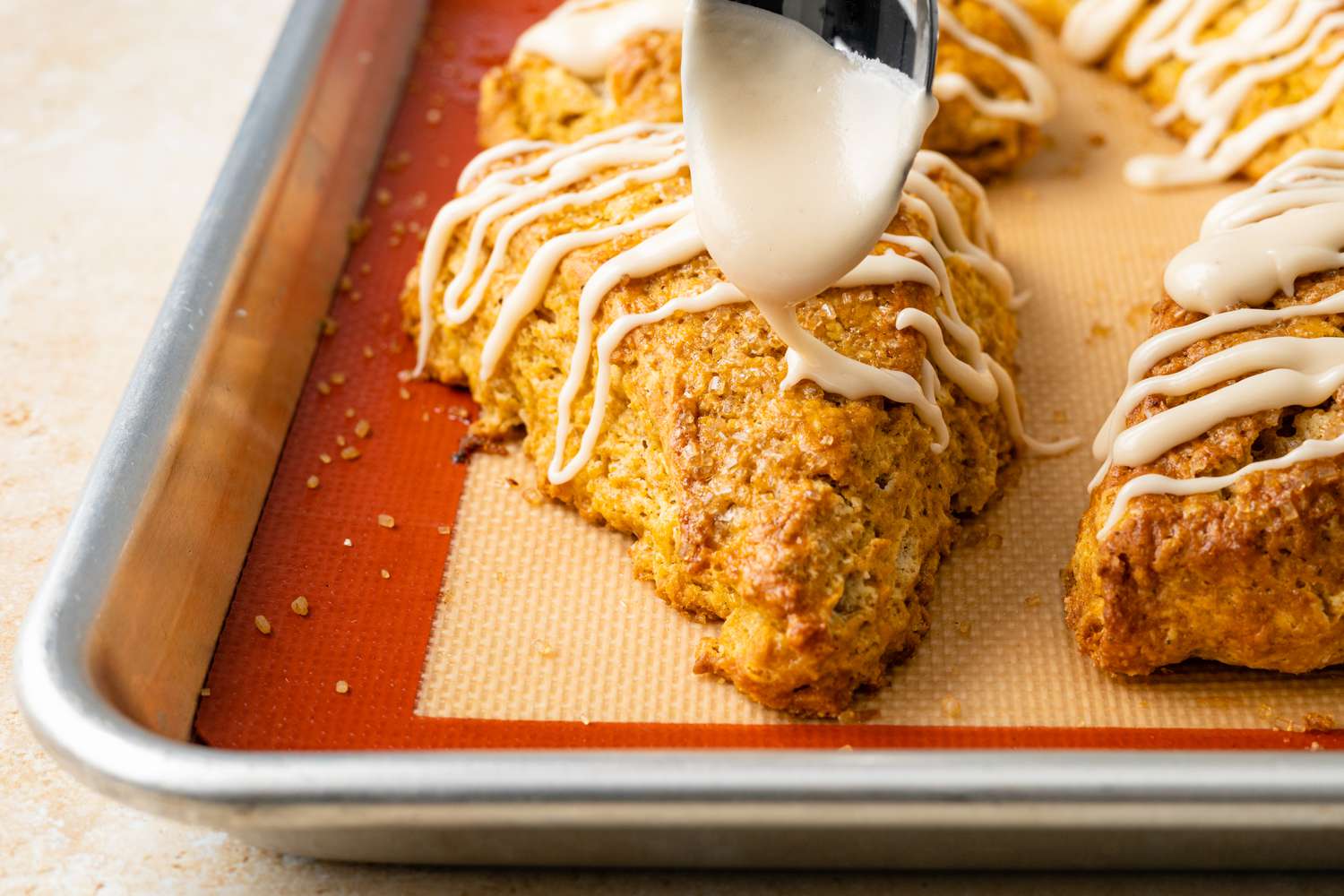 Maple Glaze Drizzled on Pumpkin Scones