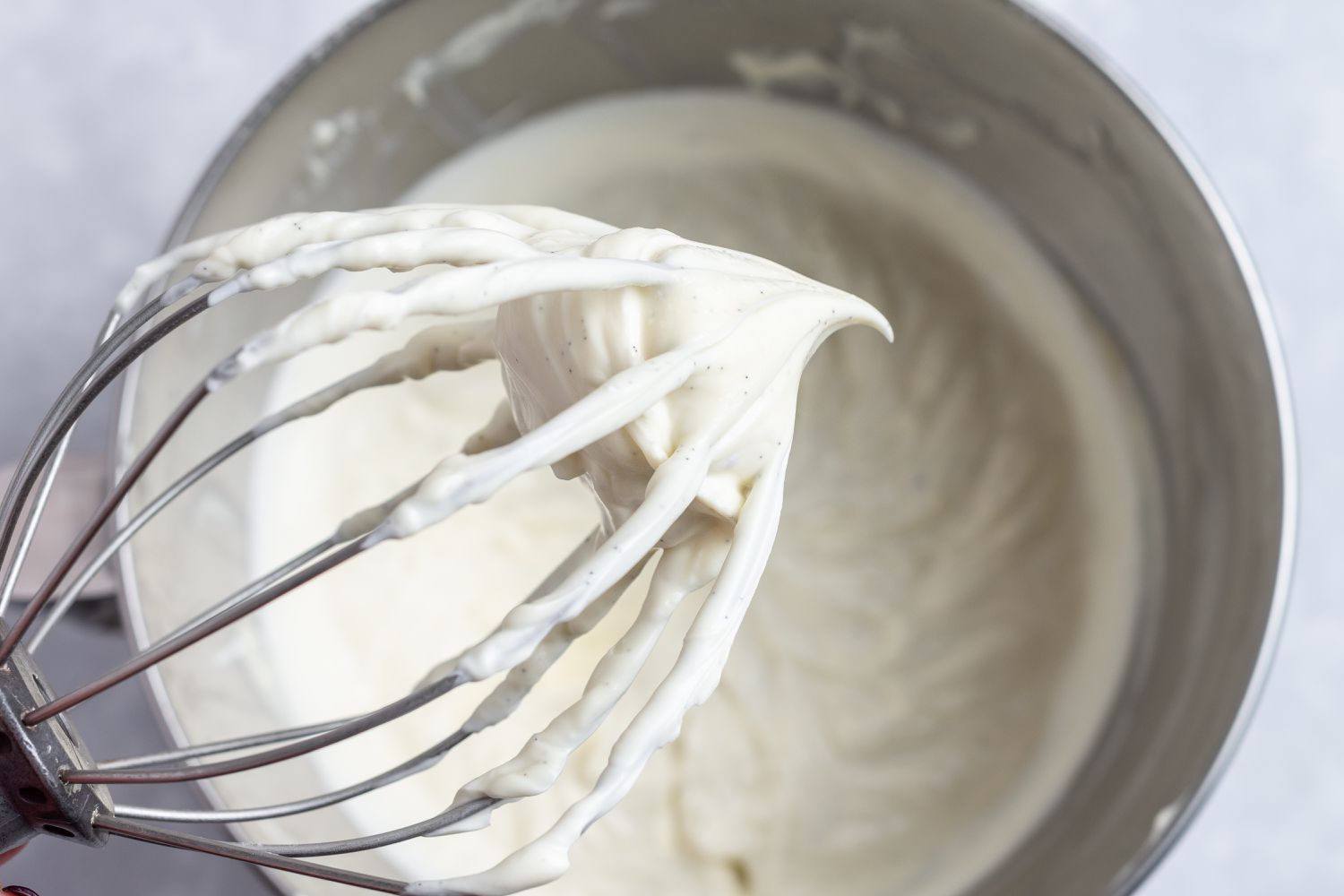 Whisk attachment whipping cream to make the no bake cheesecake filling.