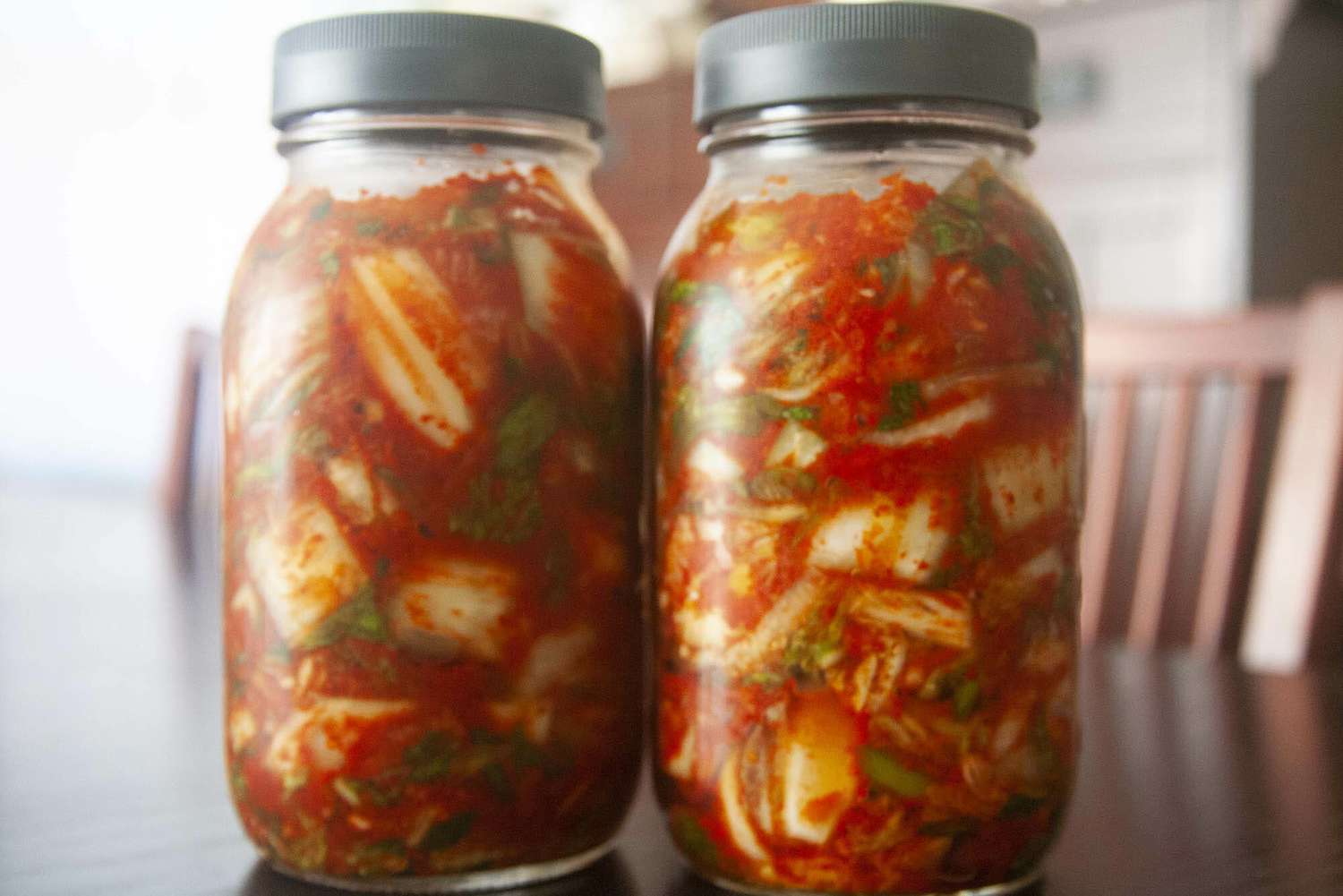 Two jars filled iwth a Korean Kimchi recipe.
