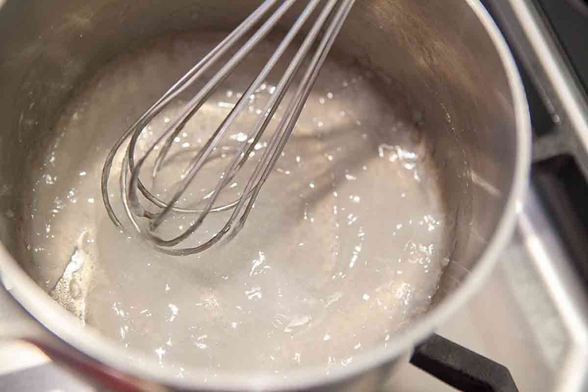 cook cornstarch mixture to thicken it for rhubarb meringue