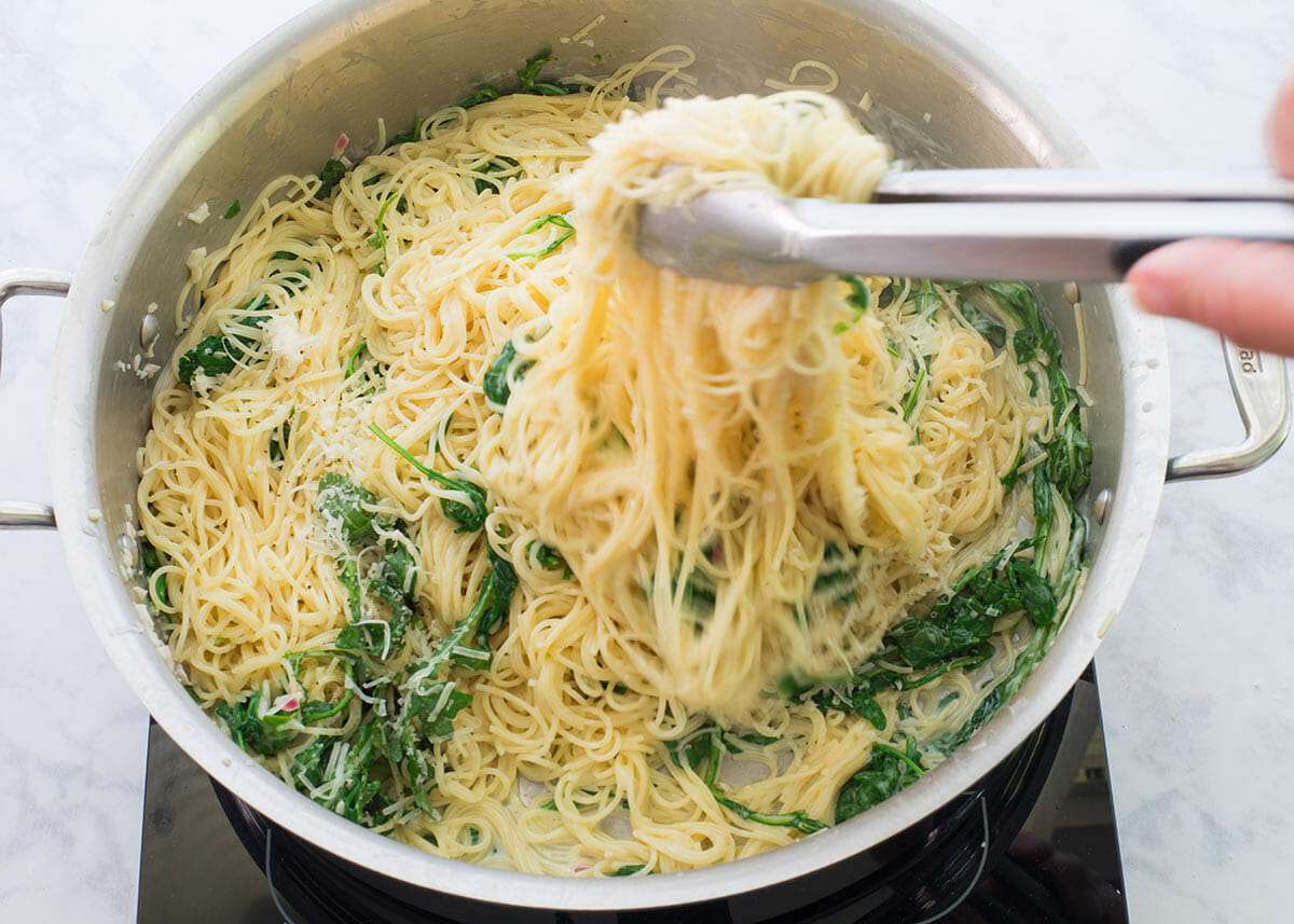 Salmon Angel Hair Pasta Recipe toss the pasta and arugula and sauce