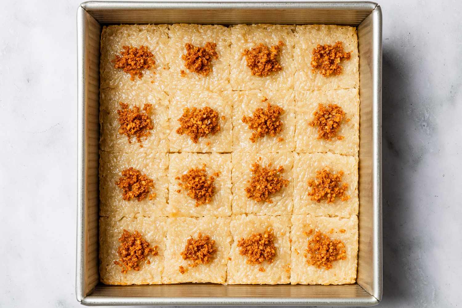 latik added to sliced biko (still in baking pan)