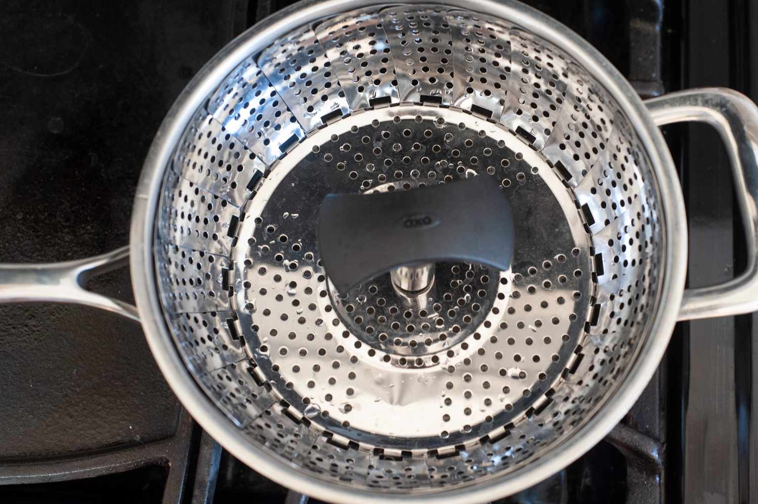 Steamer basket used to make a summer stone fruit salad with champagne vinaigrette.