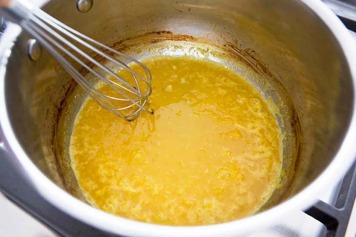 reduce liquid until it is almost gone and what you have is a syrup, this is your base for the orange beurre blanc sauce for seafood