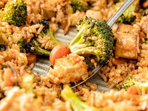 Sheet Pan Fried Rice on Sheet Pan with a Some on a Spoon