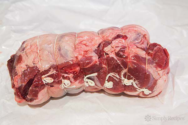 Raw leg of lamb on butcher paper