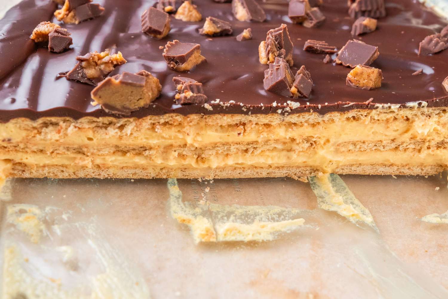 Side view of a cross section of sliced cake in a glass cake dish