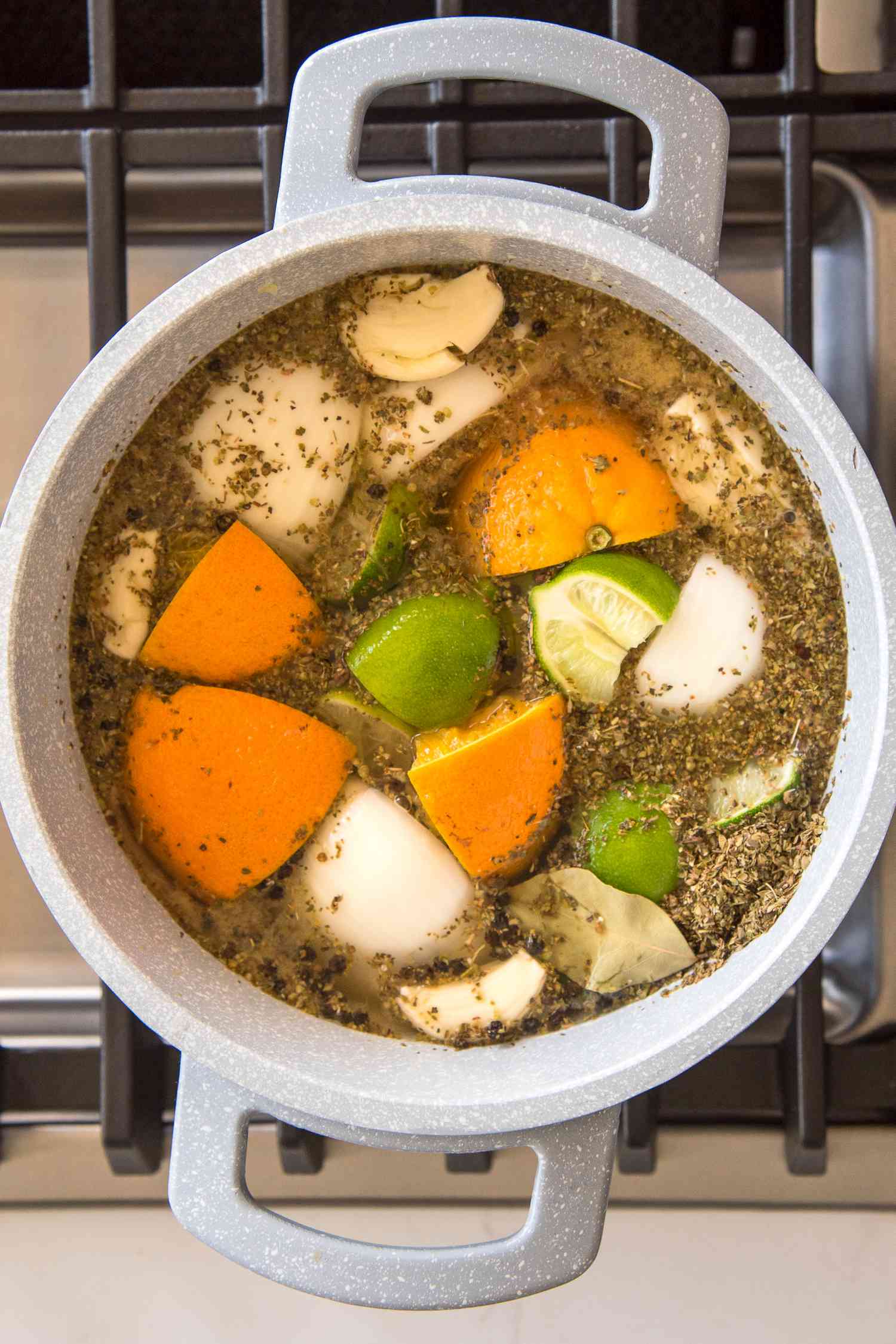 Pot of Pork Chop Brine with Orange, Lime, and Onion