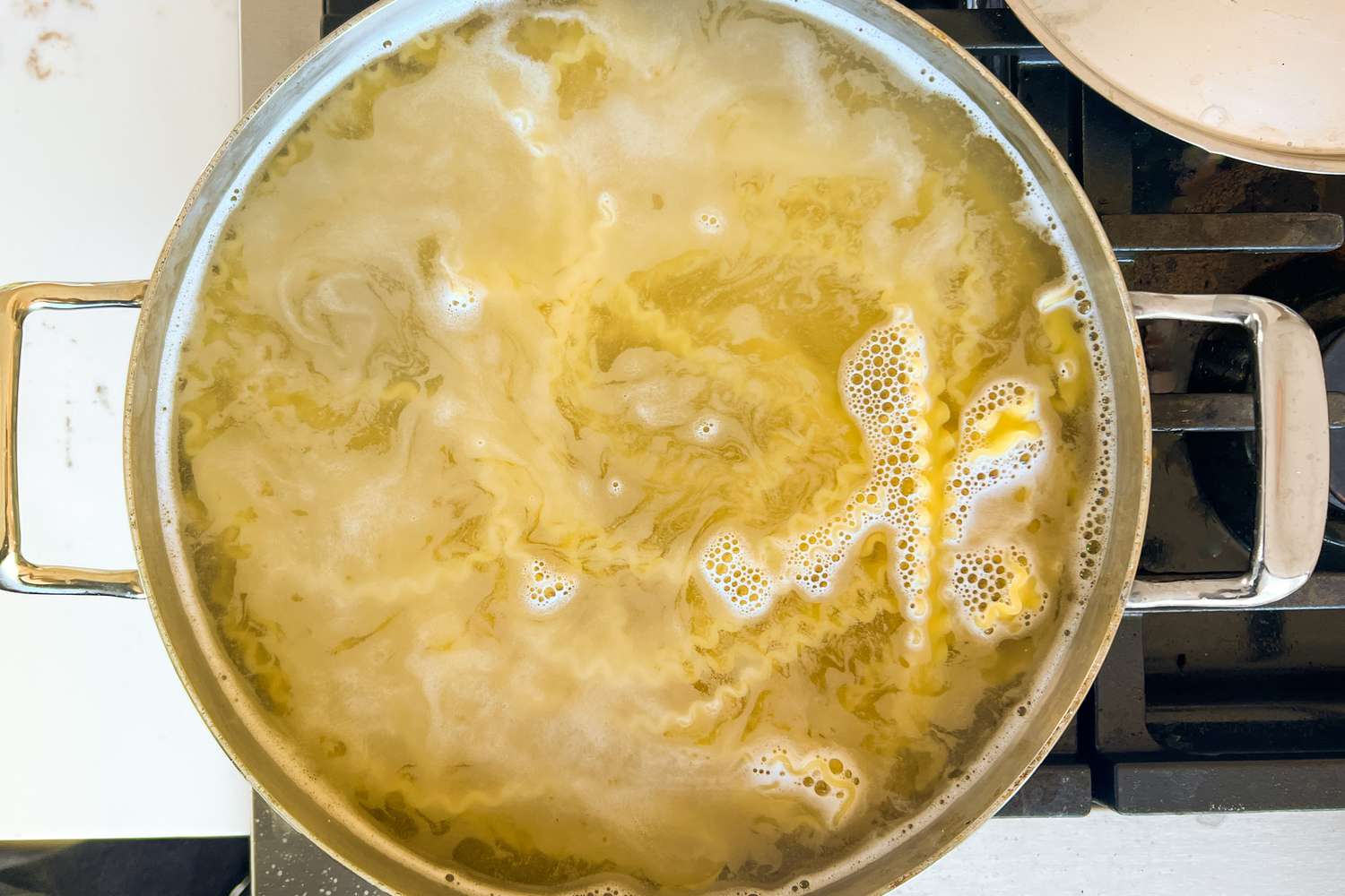 Pasta boiling in a wide pot 