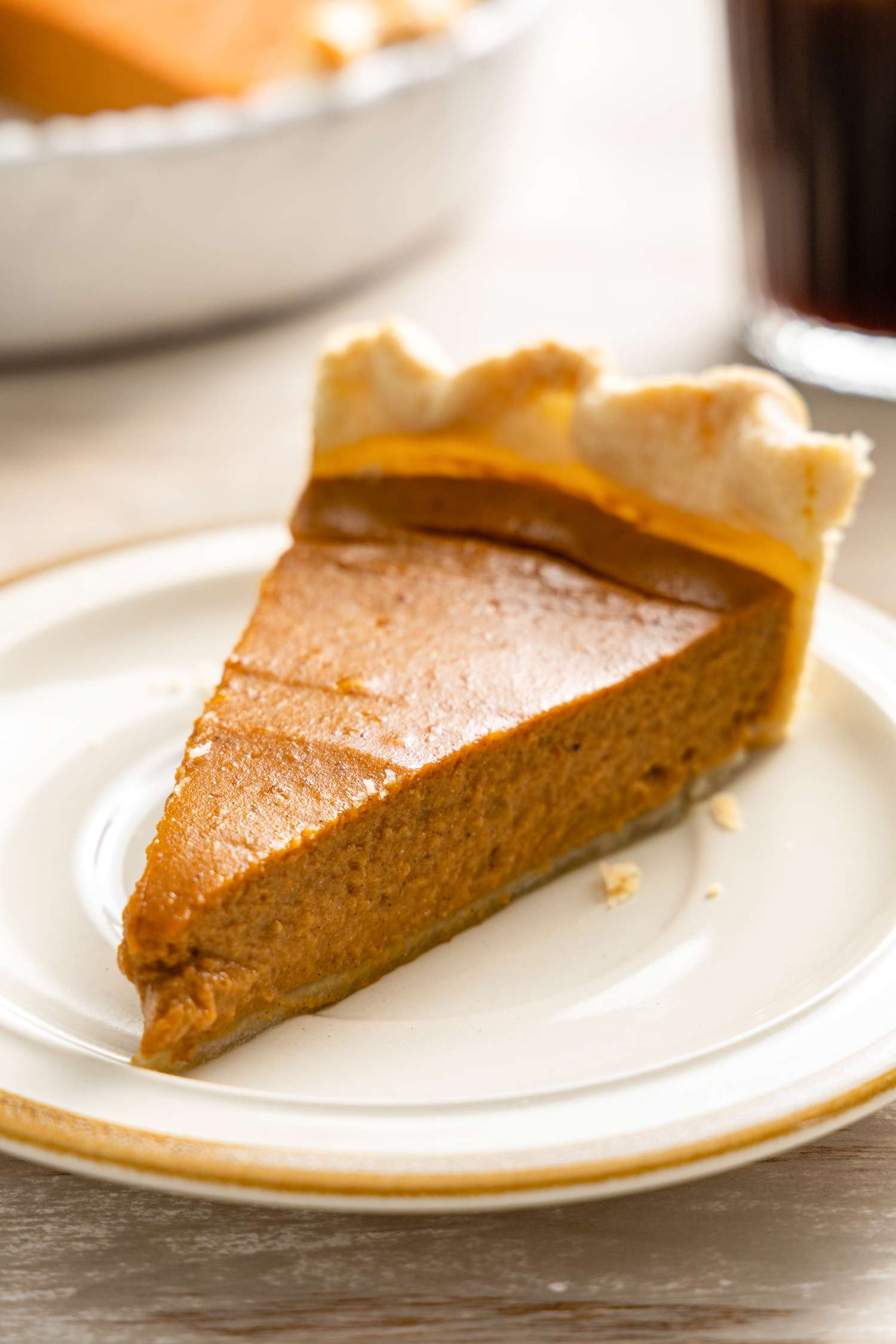 Slice of Vegan Pumpkin Pie on a Small Plate