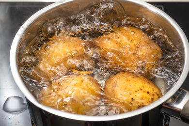 potatoes boiling in a pot