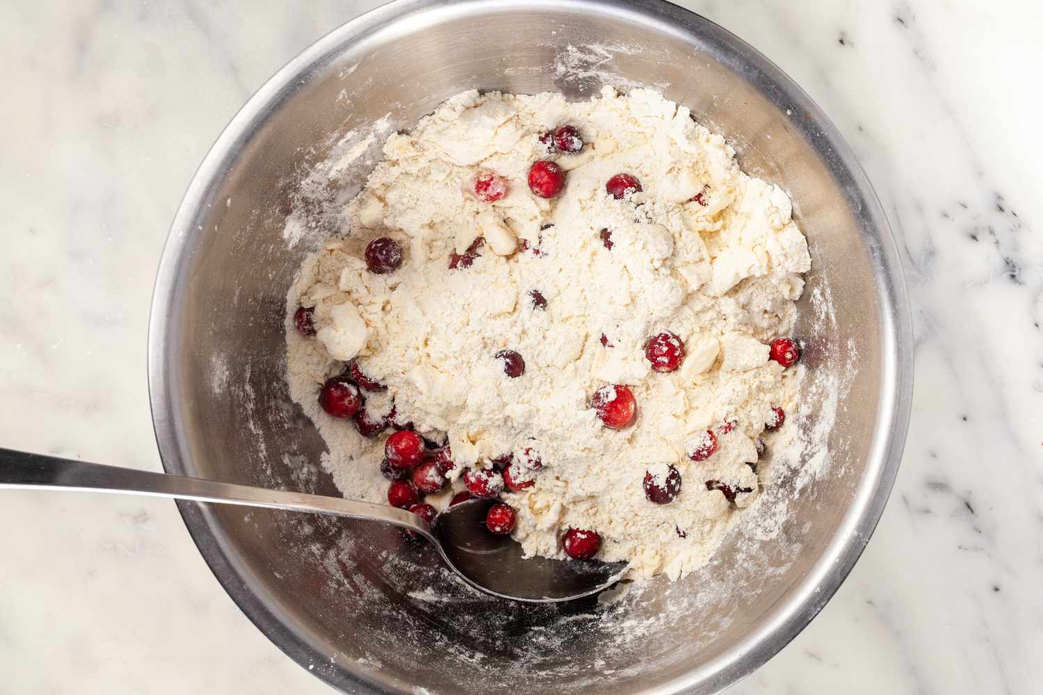 Add cranberries to dough.