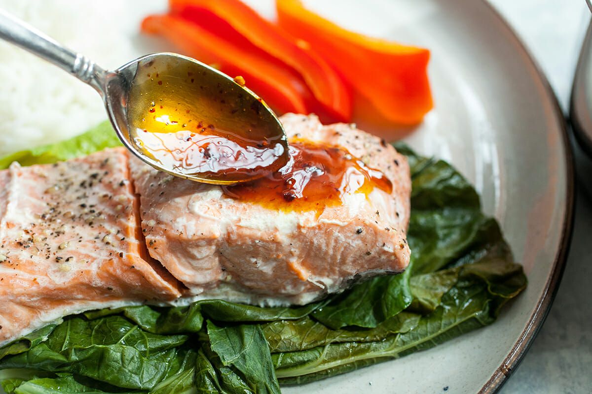 Steamed Salmon with Ginger add the sauce and serve