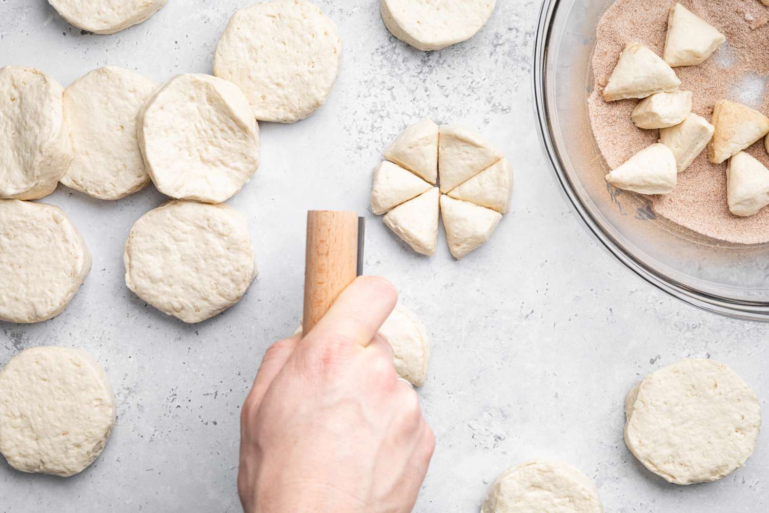 Canned Biscuit Dough Cut Pieces (Six Pieces Per Biscuit) Using a Bench Scraper for Easy Monkey Bread Recipe