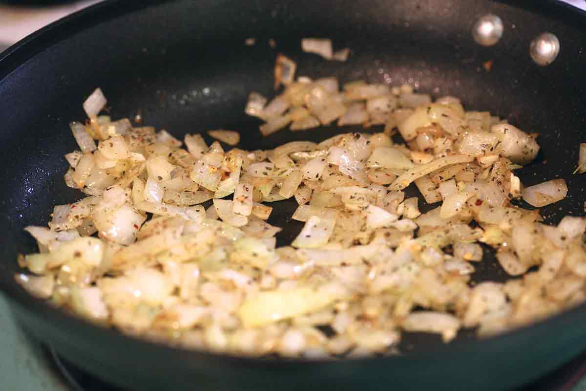 saute onions for the sauce for the penne pasta