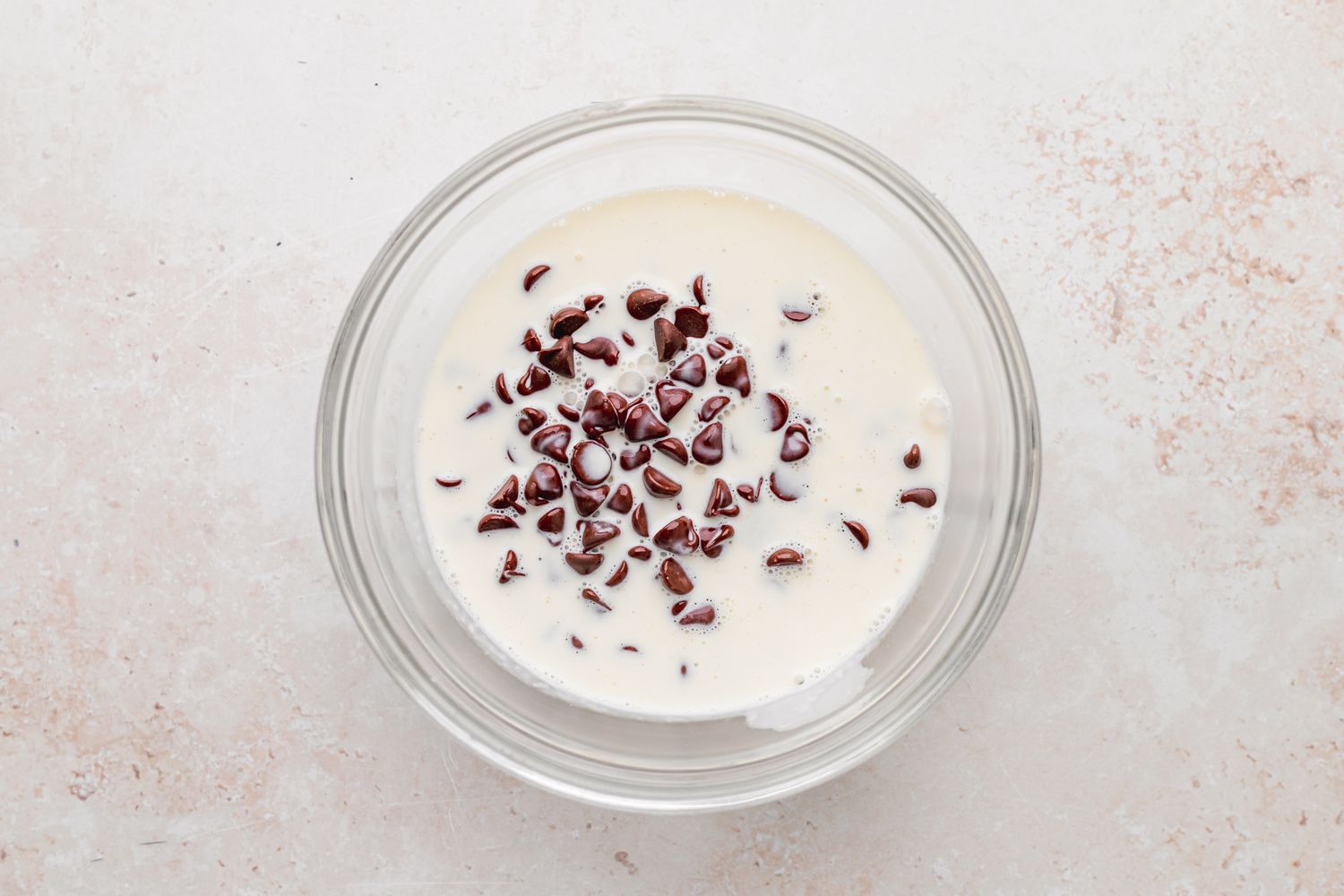 Chocolate Chips in a Bowl of Cream for Ice Cream Cake
