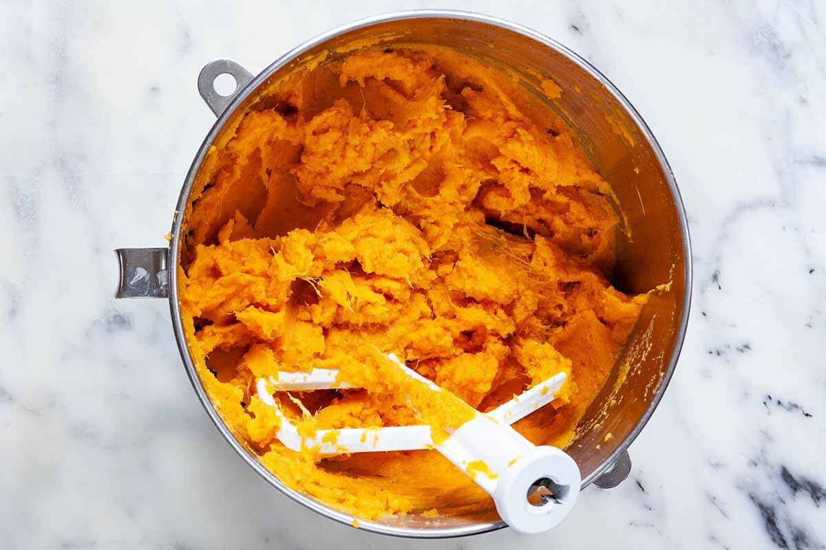 Easy Sweet Potato Casserole with Marshmallows mash the sweet potatoes