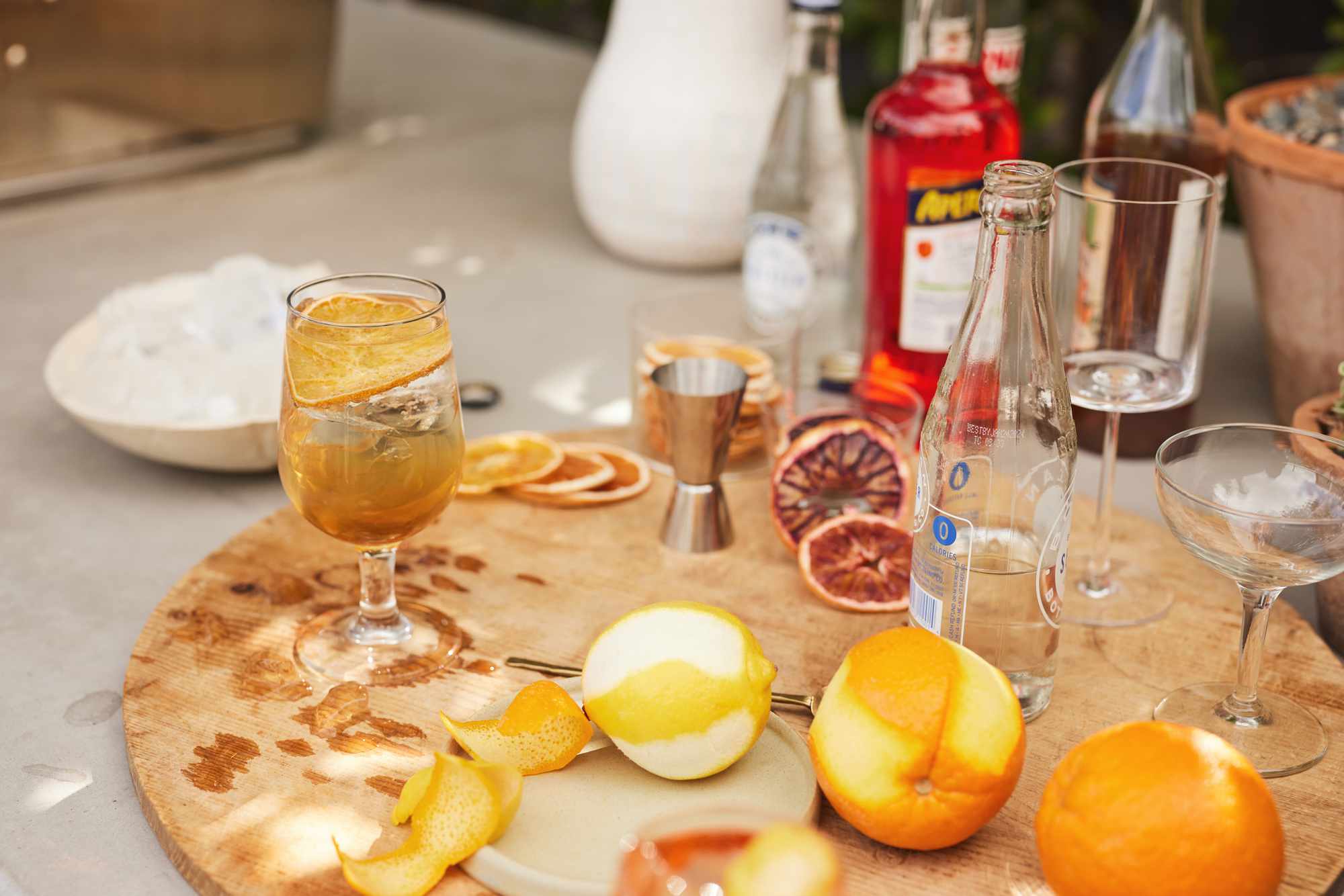 Gaby's spritz bar with Camapri, Amaro, Cynar, soda water, ice, and citrus 