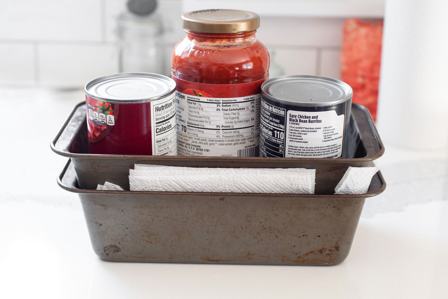 Tofu Pressed between Two Loaf Pans with Cans for Crispy Air Fryer Tofu Recipe