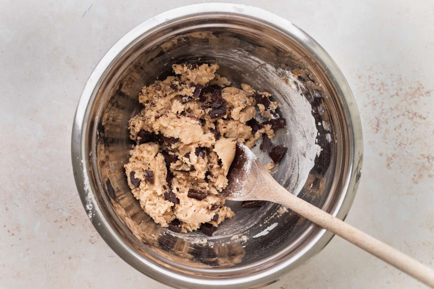 Mixing the dough for vegan chocolate chip cookies.
