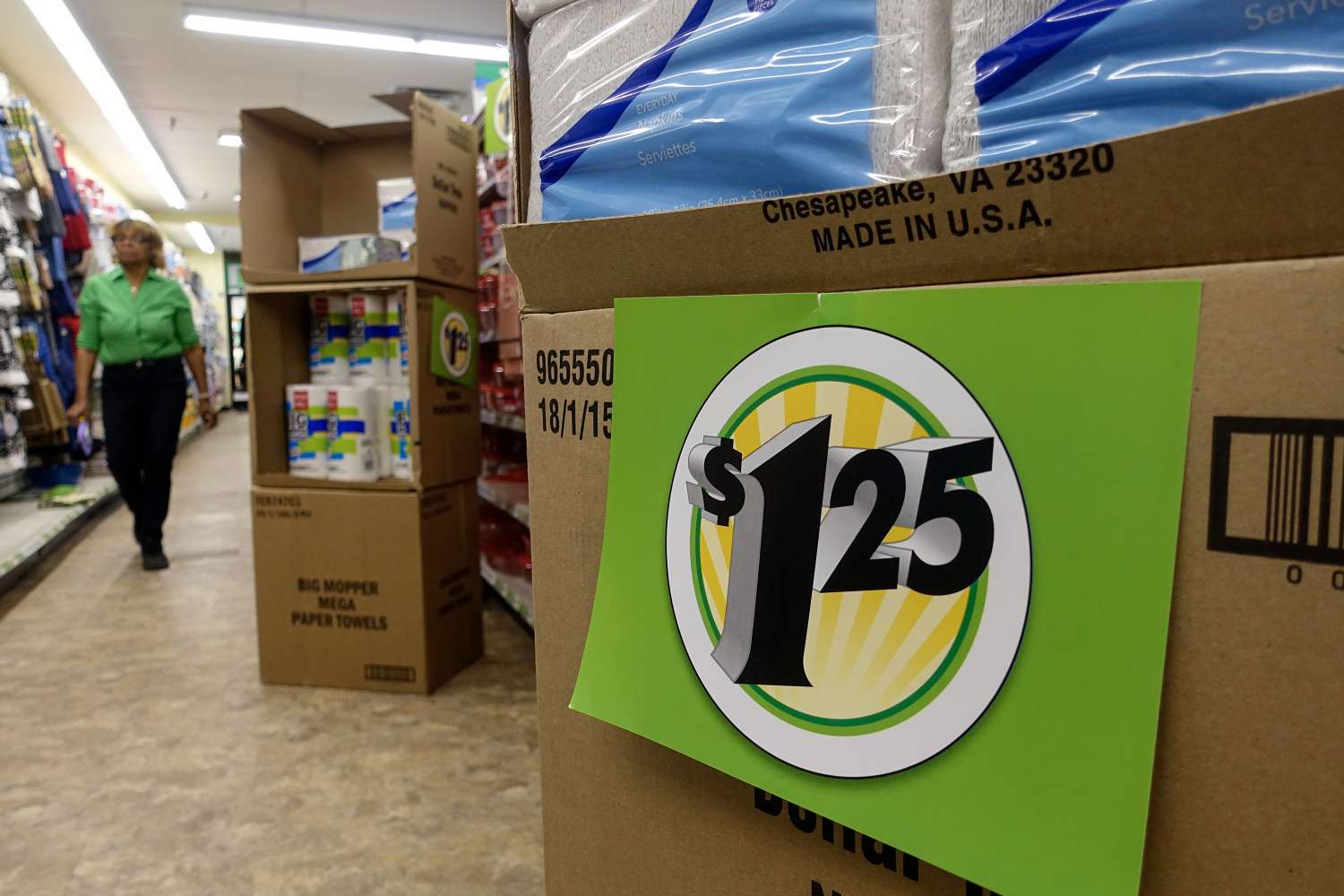 A store aisle with a box displaying a 125 label in the foreground