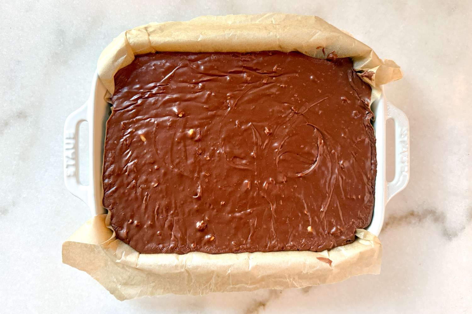 overhead view of plate of Mamie Eisenhower’s Million Dollar Fudge in a parchment lined baking dish