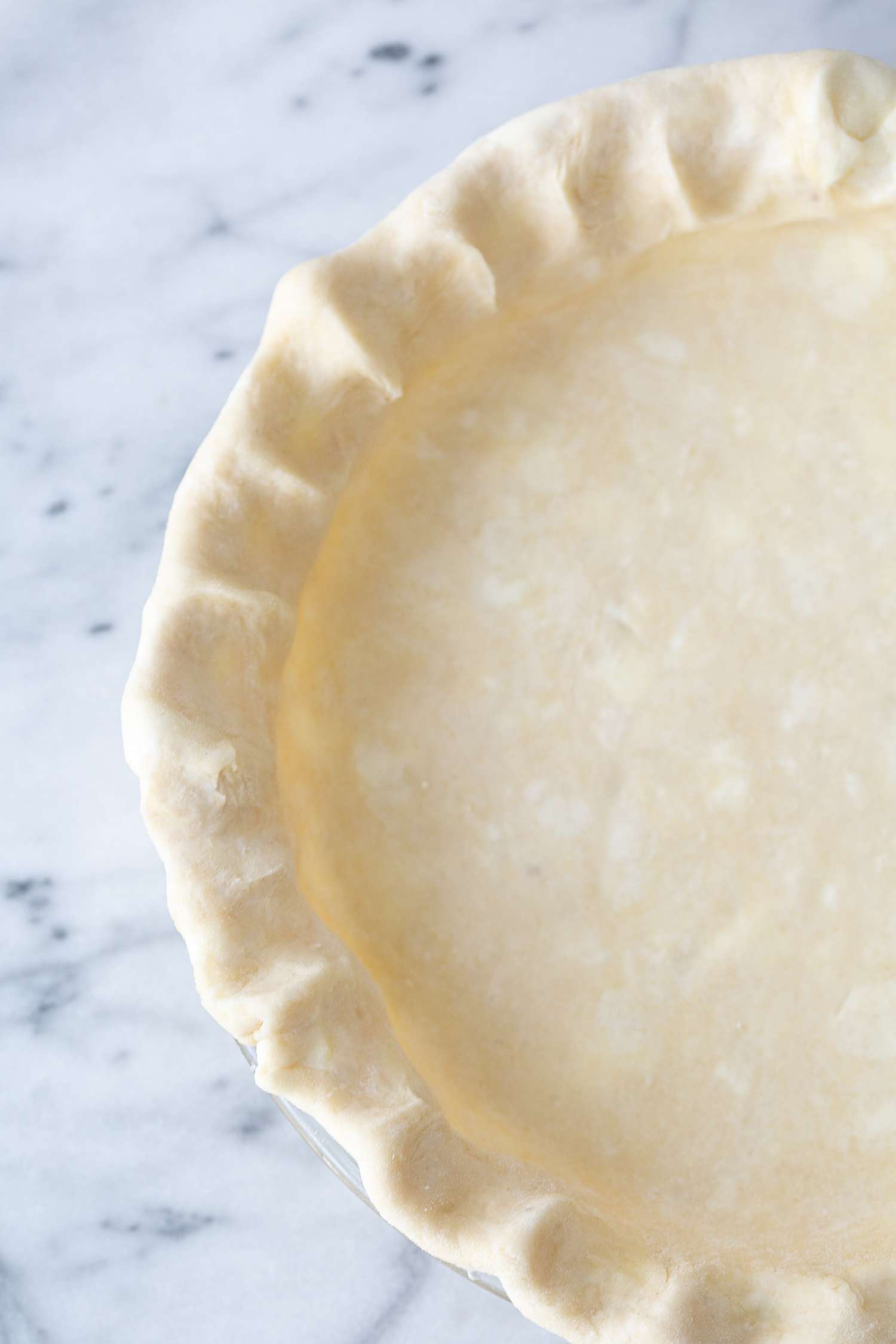 Unbaked Sour Cream Pie Crust in a Pie Pan