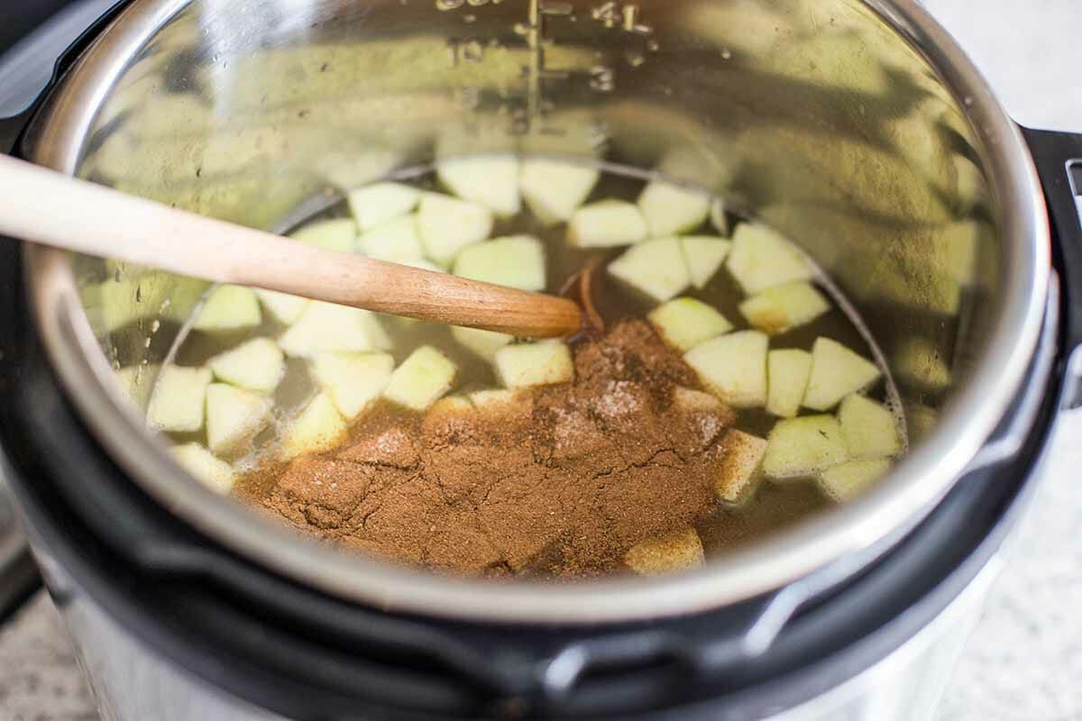 Add the liquid, apples, and cinnamon to the instant pot for instant pot oatmeal